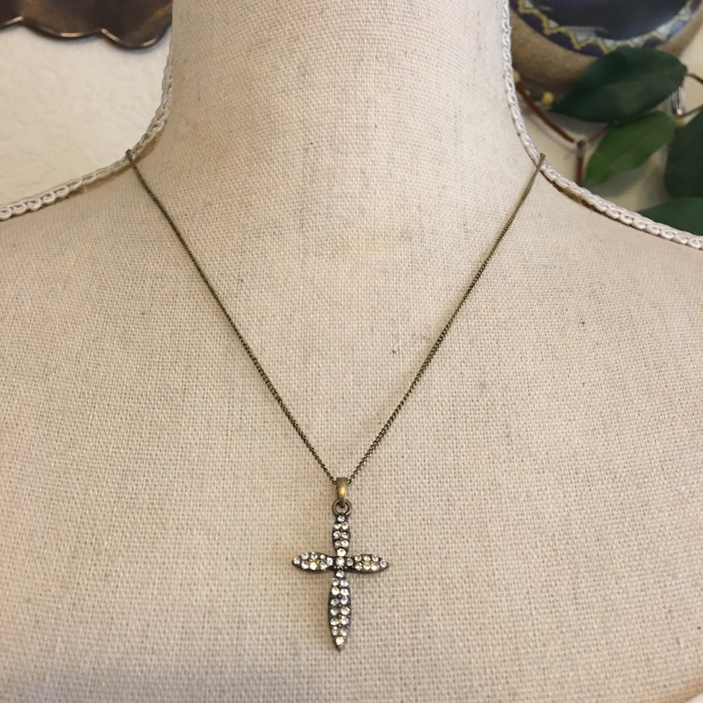 Brass tone rhinestone cross on chain necklace